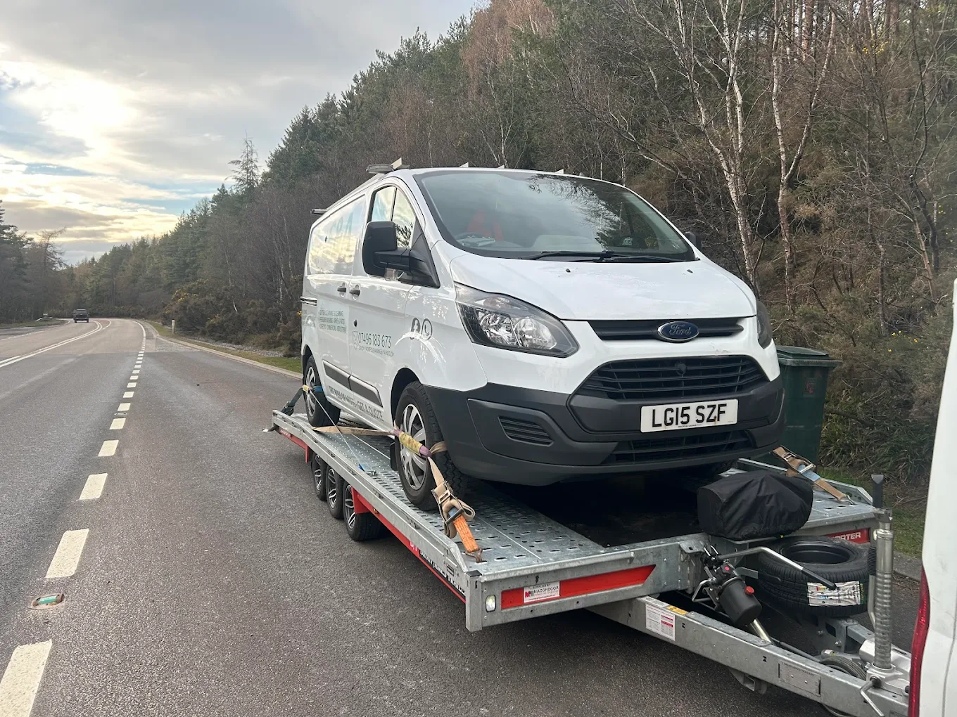 KJP recovery truck loading a vehicle near Banff & Macduff
